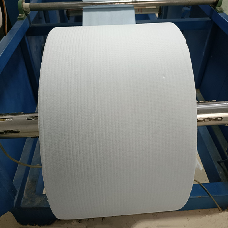 Paper laminated fabric rolls for medical bed sheets